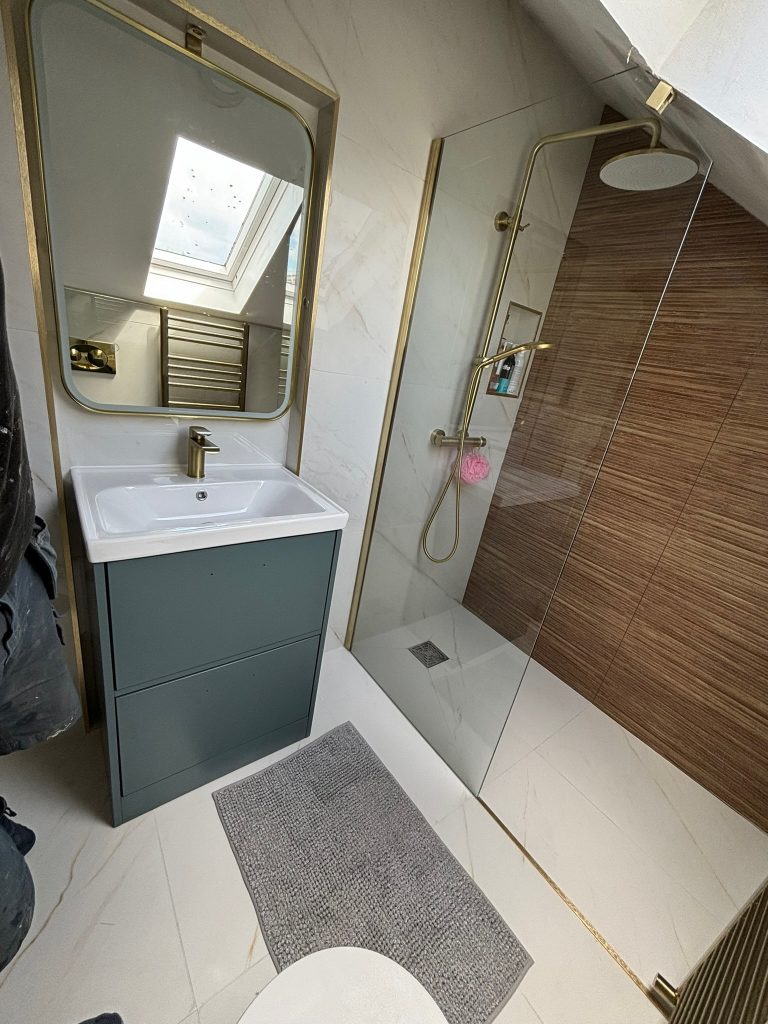 Small attic bathroom renovation with recessed vanity and wet room shower in Clontarf