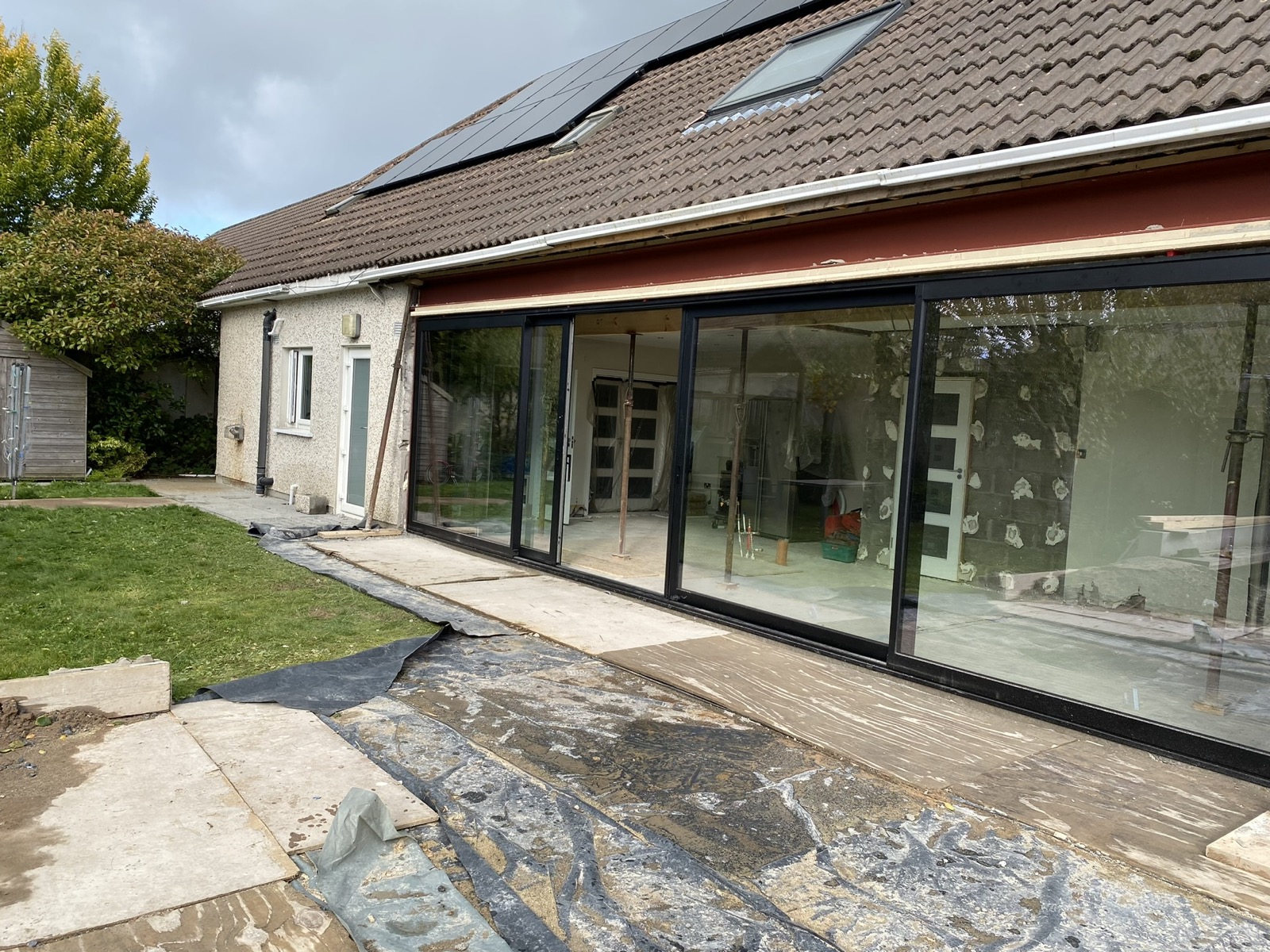 Steel and glazing stage during a Ratoath rear wall knock-through project