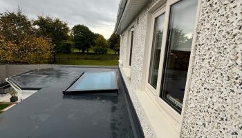 Flat roof covering with bespoke roof lights for natural light